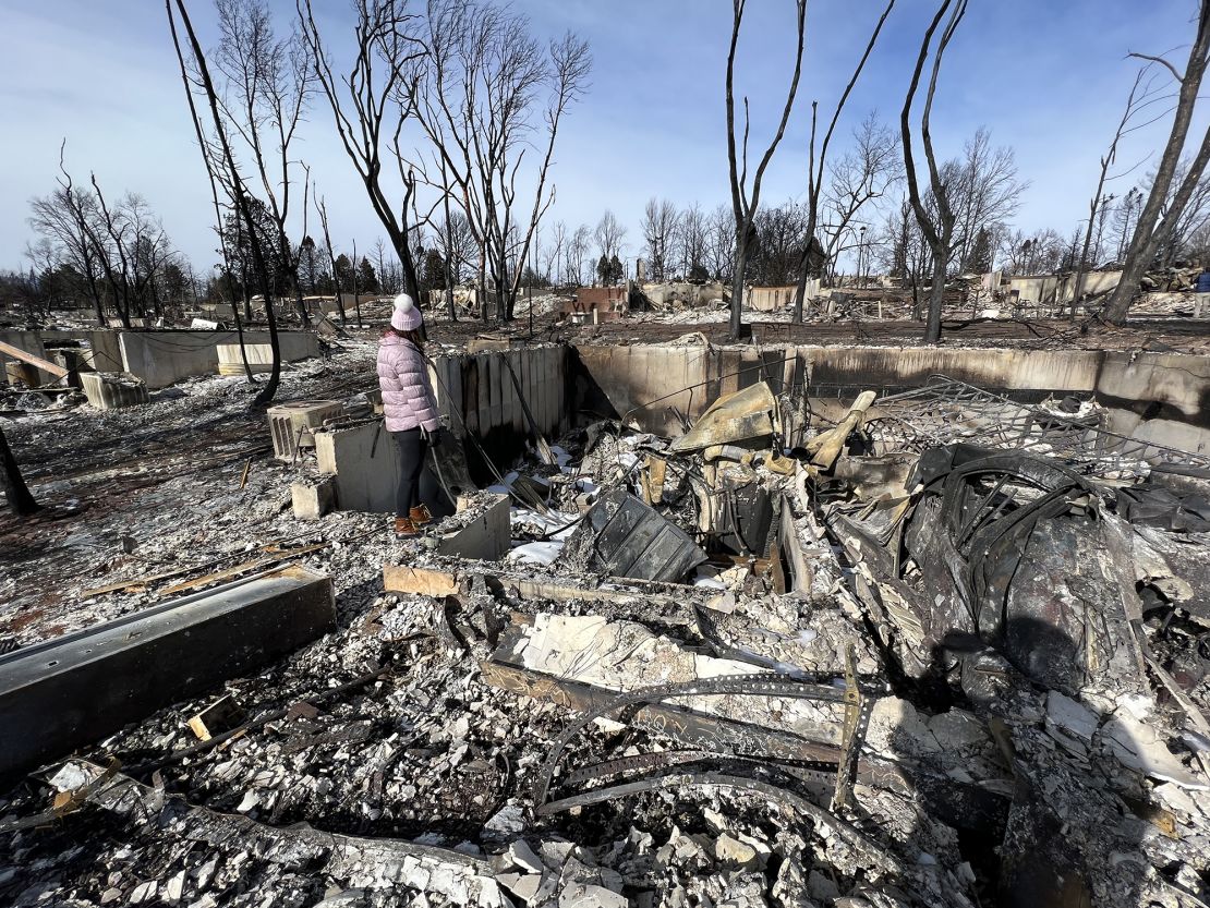 On January 5, 2022, Allison Bequette went to her house's site in Louisville, Colorado, for the first time after the fire with her daughter (pictured), who grew up in that house.