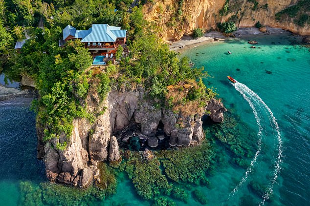 Covert comfort: On a visit to Dominica, Mark Palmer checks into Secret Bay resort (pictured)