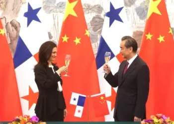 China News Service Picture of China's foreign minister Wang Yi (right) toasting Panama's foreign minister Isabel Saint Malo de Alvarado