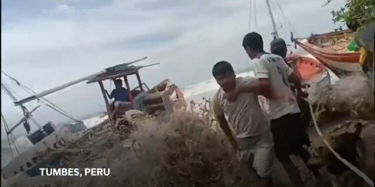 Peru's Navy rescues dozens of fishermen stranded at sea as giant waves pound shore