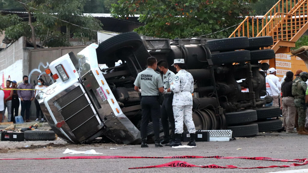 US authorities say new cross-border strategy led to six arrests in deadly truck smuggling case