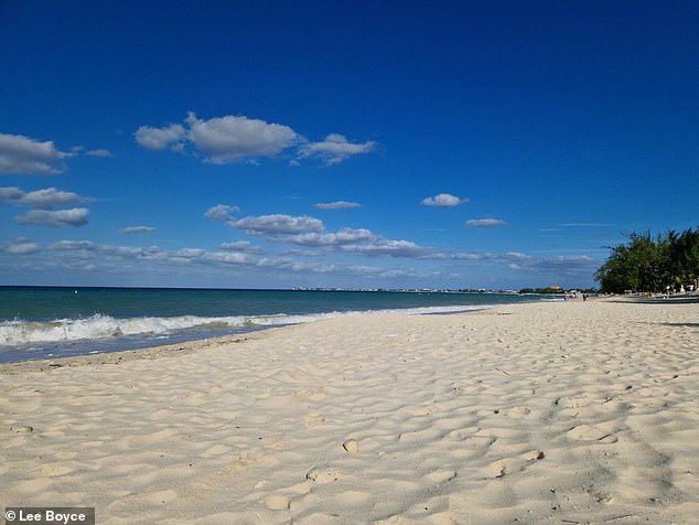 Seventh heaven: The jewel in the crown of the Caymans is Seven Mile Beach - plenty of sandy paradise to go round