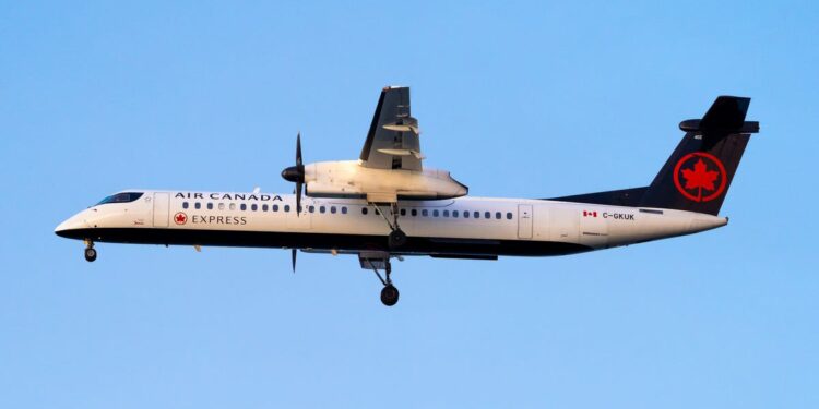Air Canada flight skids down runway during hard landing, catches fire