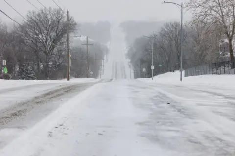 Getty Images A deserted highway in Shawnee, Kansas, on Sunday