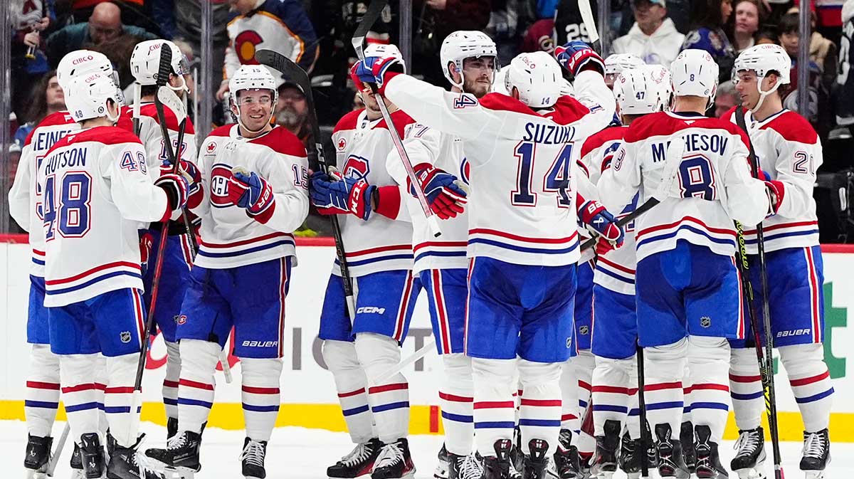 Members of the Montreal Canadiens celebrate the shootout win over the Colorado Avalanche in the at Ball Arena.