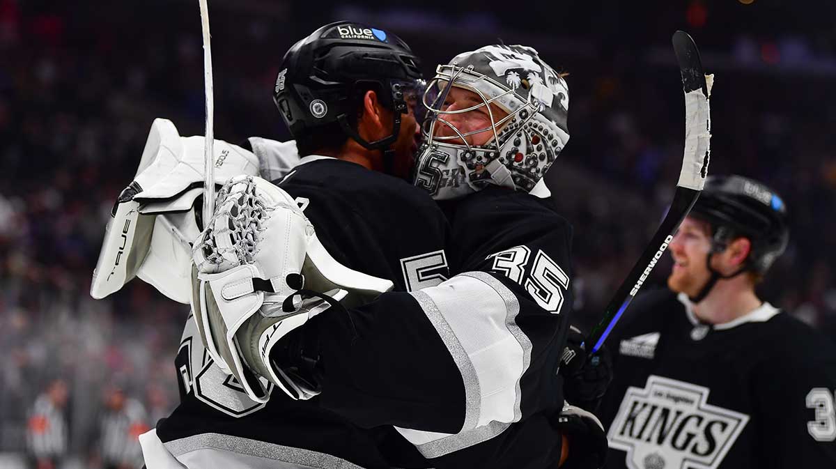 Los Angeles Kings right wing Quinton Byfield (55) celebrates his goal scored against the Edmonton Oilers for the overtime victory with goaltender Darcy Kuemper (35) at Crypto.com Arena.