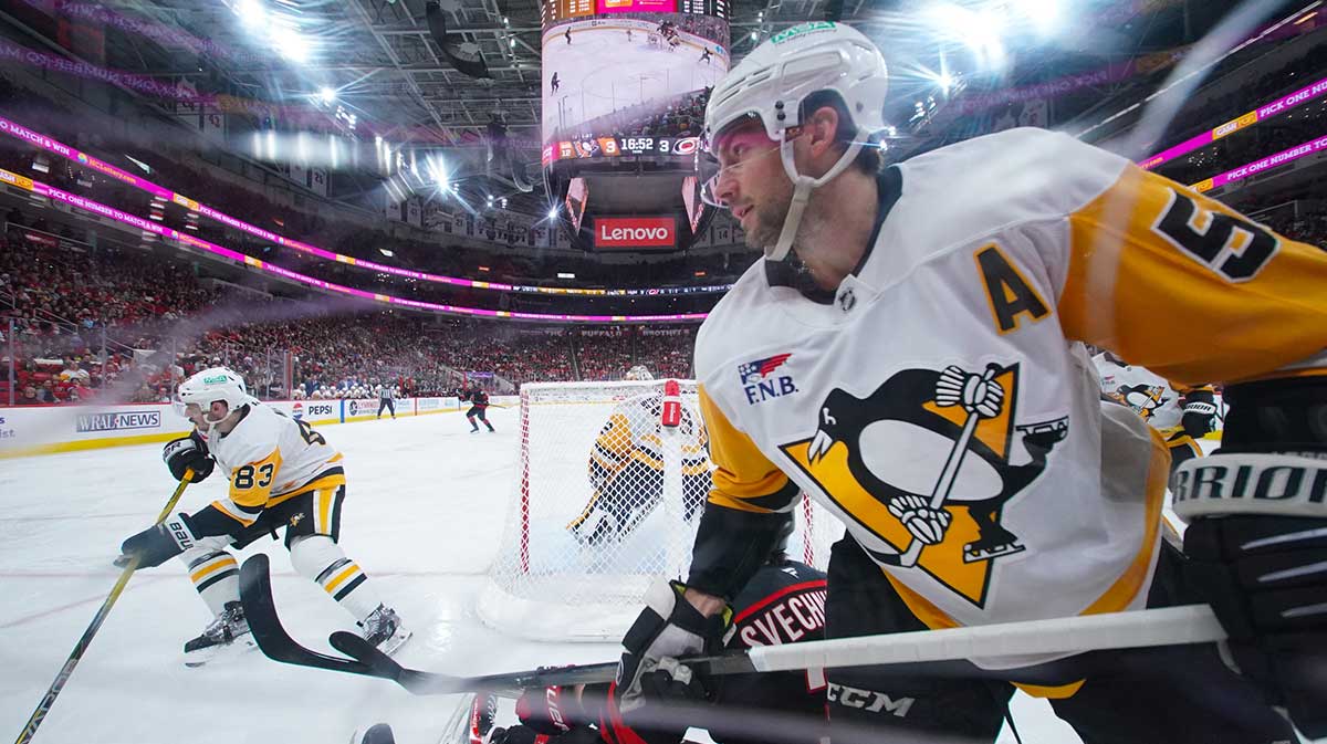 Pittsburgh Penguins defenseman Kris Letang (58) watches the play against the Carolina Hurricanes during the third period at Lenovo Center.