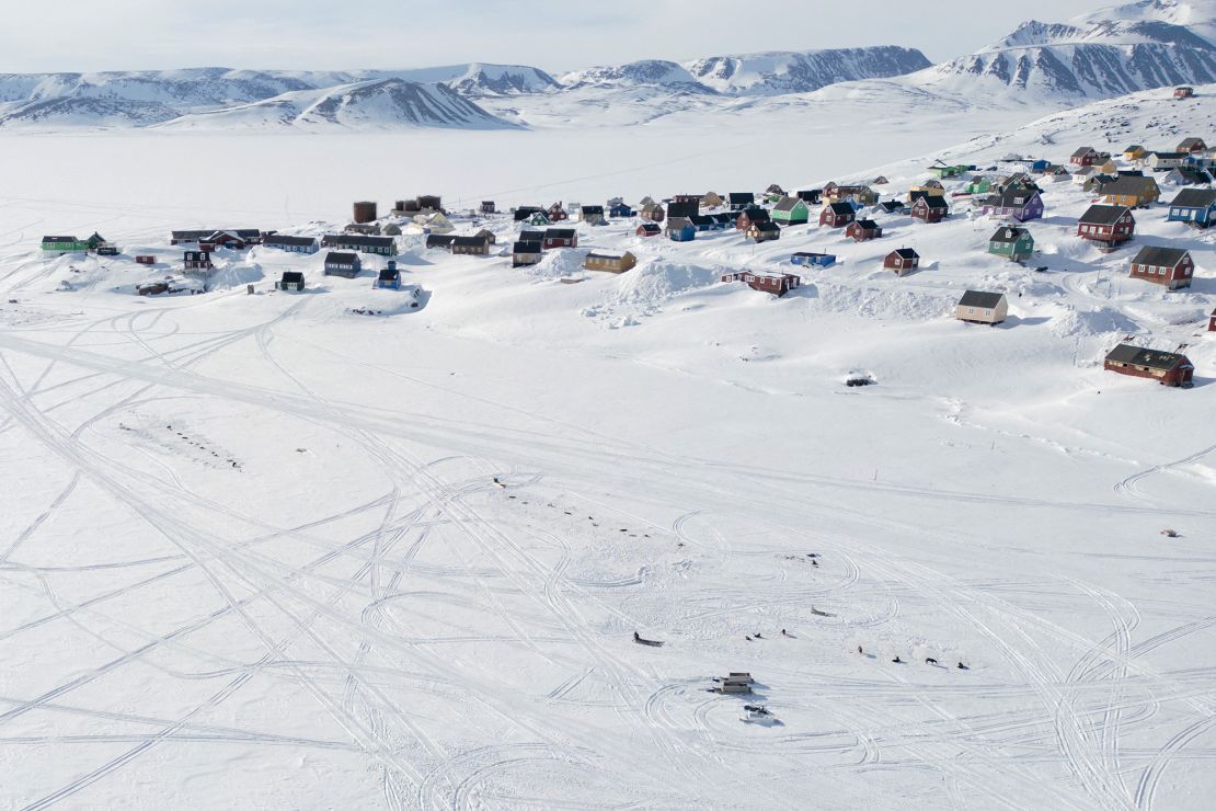 An aerial photograph taken in April 2024 shows the remote village of Ittoqqortoormiit in eastern Greenland.