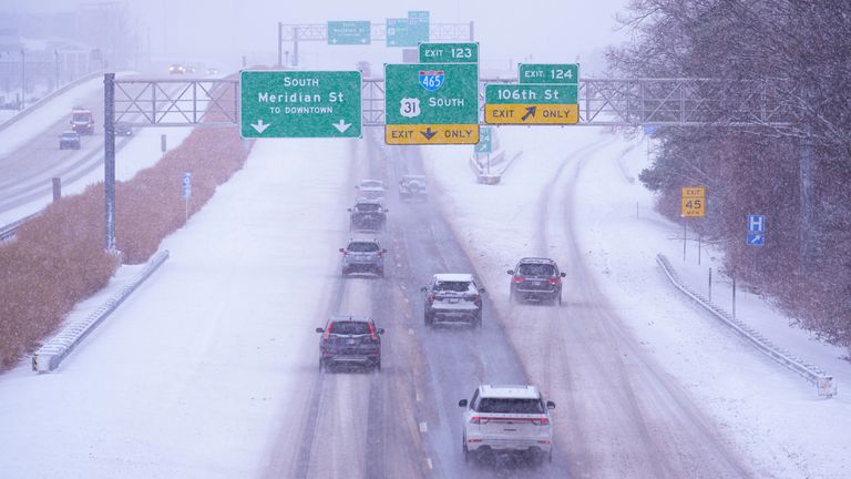 The National Guard was activated in Indiana to help stranded drivers. Pic: AP