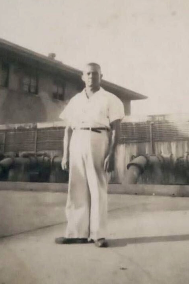 John Miller, Marjorie Miller’s great grandfather, stands next to one of the Panama Canal locks, where he worked in the 1940s.