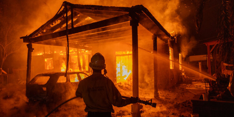 5 dead as blazes spread to Hollywood Hills, more than 100,000 evacuated