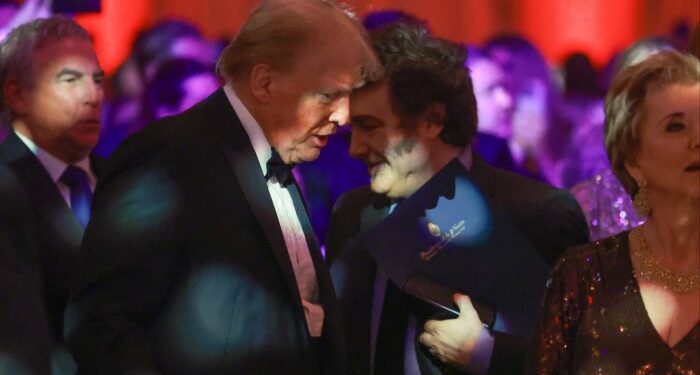 Donald Trump talks to Argentine President Javier Milei at Mar-a-Lago last year