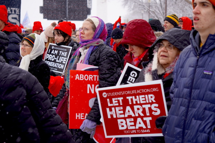 Pro-Life demonstrators endure the snow to march in the streets of Washington, D.C. during the annual March For Life on Jan. 19, 2024.