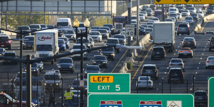 Heavy traffic moves along Interstate 395 during a morning commute Nov. 22, 2022, in Washington, D.C.