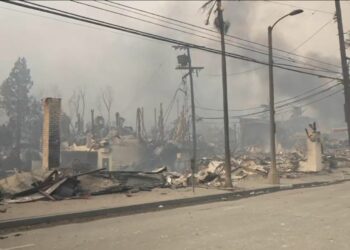 California wildfires latest: Two killed in Los Angeles wildfires - as around 70,000 people told to flee | US News