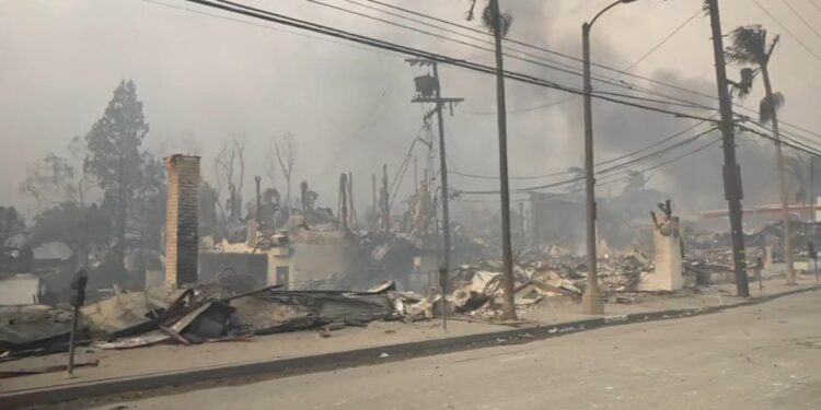 California wildfires latest: Two killed in Los Angeles wildfires - as around 70,000 people told to flee | US News