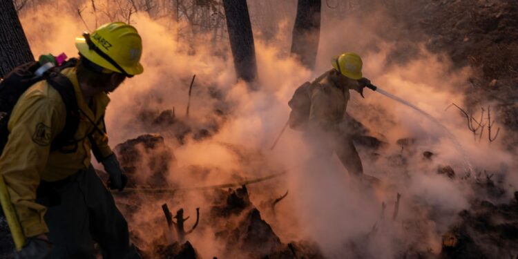 California wildfires live updates: 10 dead and 180,000 told to evacuate amid apocalyptic scenes of destruction