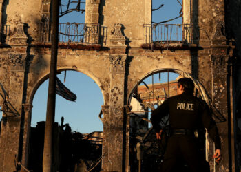 Death toll climbs to 24 with strong winds to continue