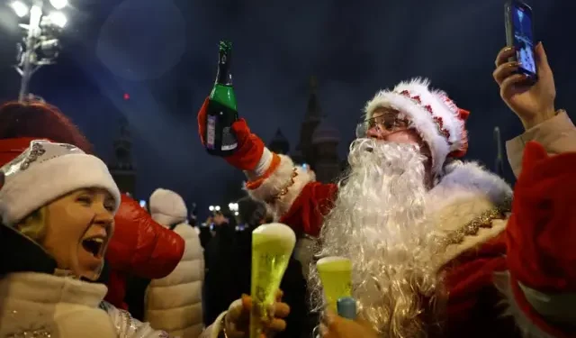 People react as they take part in New Year celebrations in central Moscow, Russia, January 1, 2025.