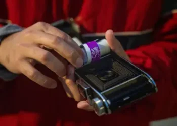 Fritz Pinnow Fabriccio Díaz is loading film into a camera that was made in the 1930s, which he was allowed to borrow from a camera store and try out.