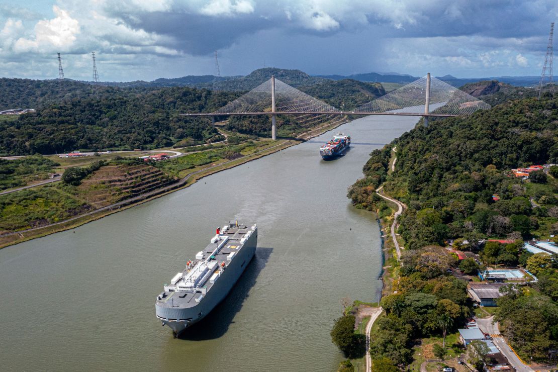 Aerial view of Panama canal in the area of Pedro Miguel locks, in Panama City on December 13, 2022. - Every time a ship crosses the Miraflores Lock, the Panama Canal's most famous gate, 200 million liters of fresh water are discharged into the sea. This operation was repeated more than 14,000 times during 2022 in this strategic passageway linking the world's two largest oceans, whose main source of energy to move ships is rainwater. (Photo by Luis ACOSTA / AFP) (Photo by LUIS ACOSTA/AFP via Getty Images)