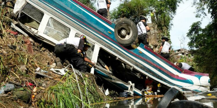 At least 55 dead after bus plunges off bridge in Guatemala