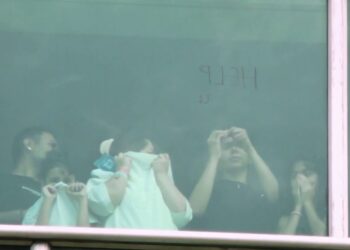 Migrants detained in Panama hotel plead for help