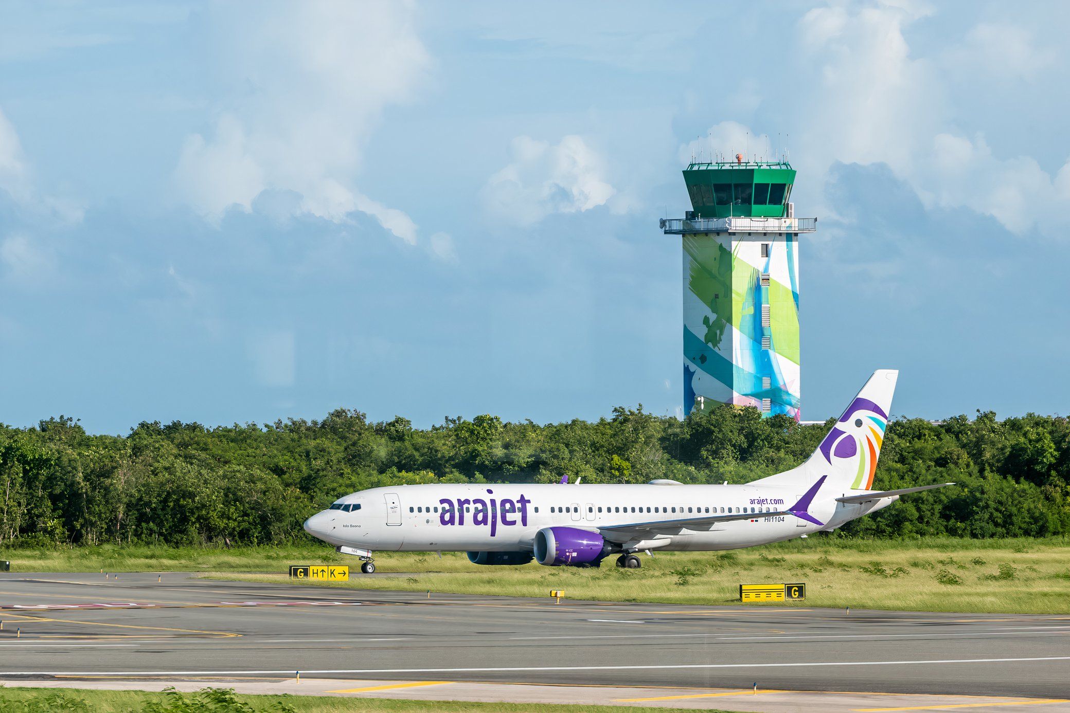 An Arajet Boeing 737 MAX 8 registered HI1104 at Punta Cana Airport (PUJ) in the Dominican Republic