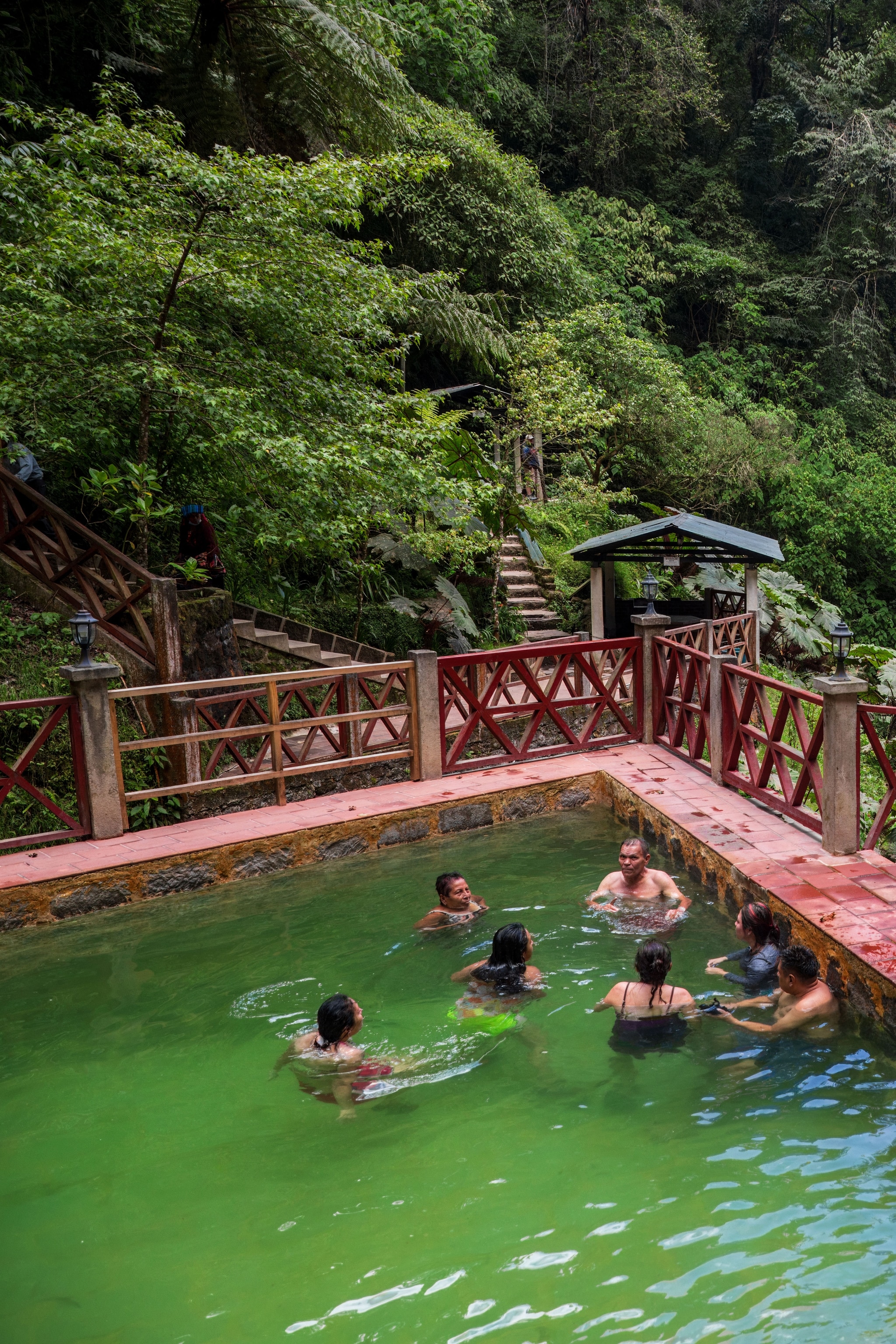 Locals relaxing at the natural hot pools at Fuentes Georginas.