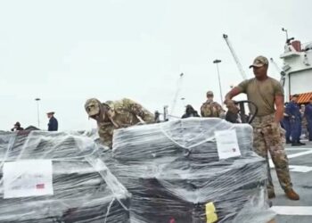 Coast Guard returns with $275 million in cocaine, down one crew member