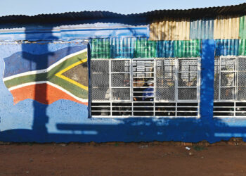 Residents attends a meeting at a community hall on the outskirts of Johannesburg, South Africa