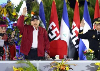 Handout picture published by the official news outlet El 19 Digital shows Nicaragua's President Daniel Ortega (C), his wife, Vice-President Rosario Murillo (L), and the Police Commander Francisco Javier Díaz Madriz during his swearing-in ceremony in Managua on February 26, 2025.