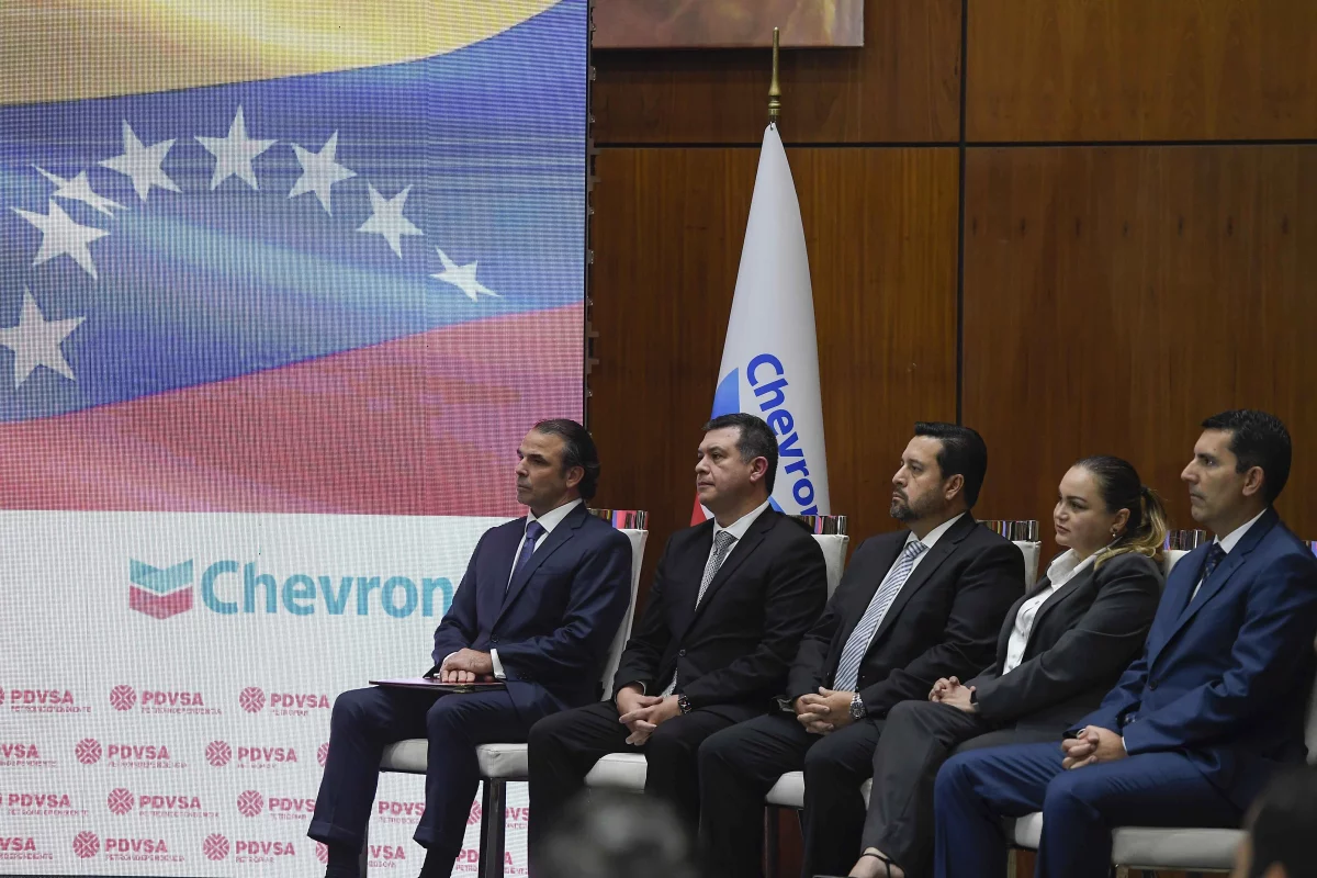 Chevron President in Venezuela, Javier La Rosa, left, attends a signing agreement ceremony between Venezuela and the California-based Chevron, in Caracas, Venezuela, Dec. 2, 2022.