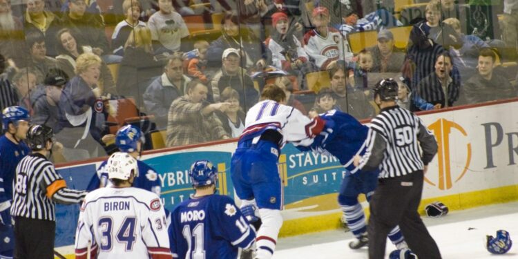 Watch Team Canada and Team USA fight 3 times in a minute