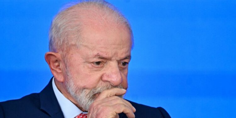 Brazil's President Luiz Inácio Lula da Silva gestures during a ceremony to announce investments in the defence industry at the Planalto Palace in Brasilia on February 12, 2025.