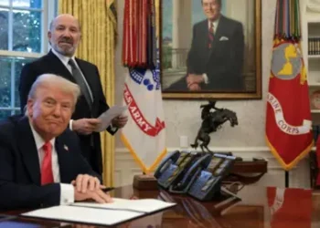 Getty Images U.S. Commerce Secretary Howard Lutnick (2nd-L) speaks as President Donald Trump prepares to sign an executive order in the Oval Office at the White House on February 25, 2025 in Washington, DC.