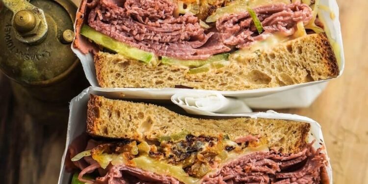 Discovering America’s Future: A Flavorful Journey Through a Pastrami Sandwich in Queens