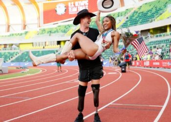 Woodhall Shatters Records with Stunning 100m and 400m Title Sweep!