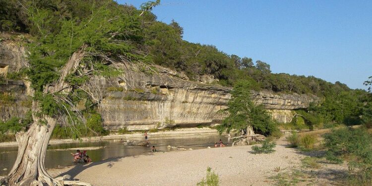 Experience the Thrilling Surge of Floodwaters Along the Guadalupe River!